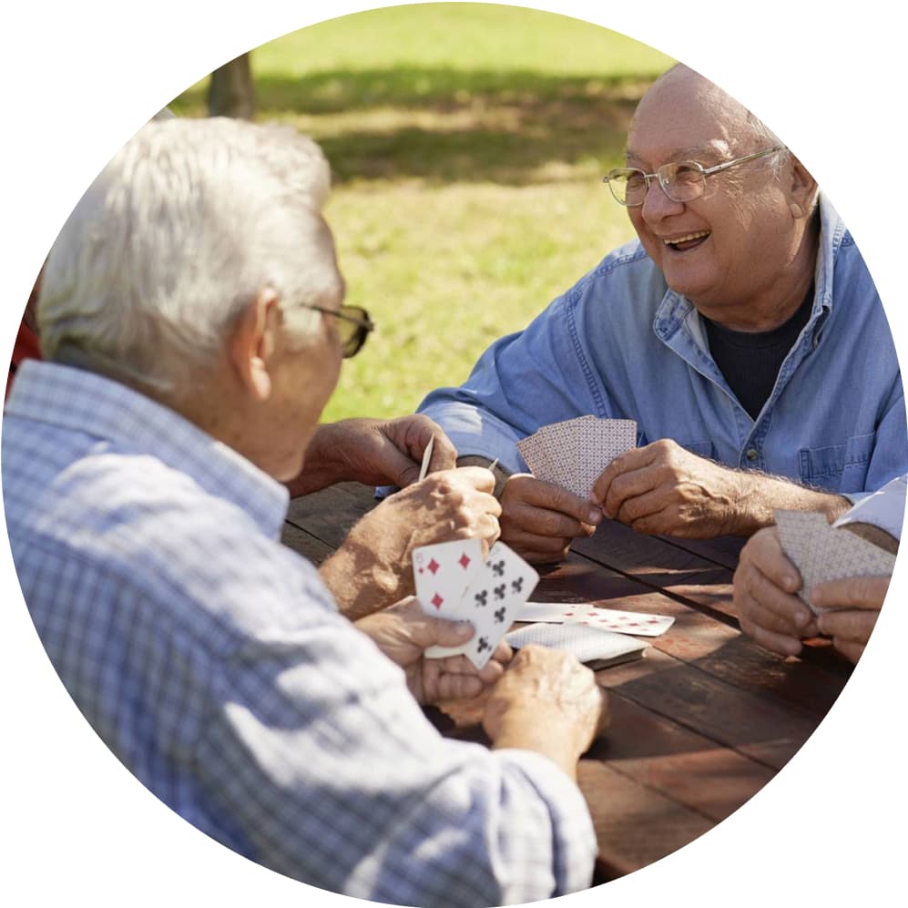 Several people playing cards